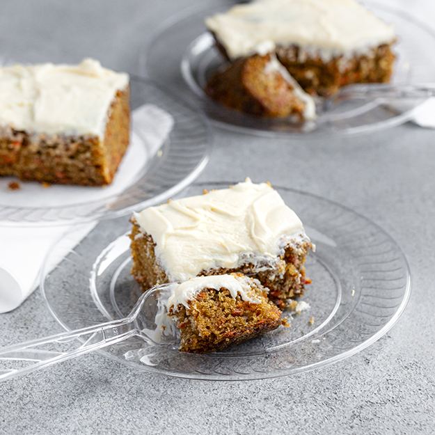 Frosted carrot cake on a Chinet crystal plate