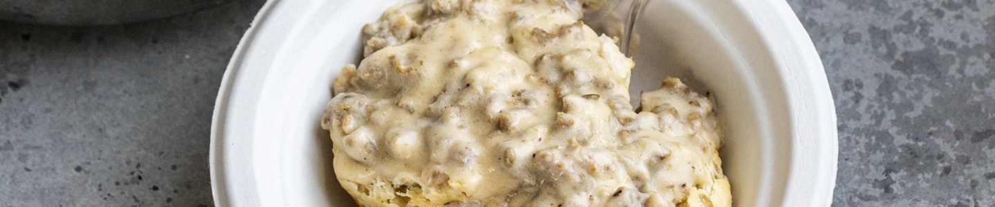 Biscuits and gravy in a Chinet bowl