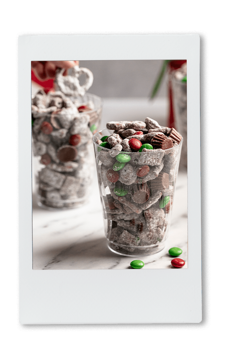 Instax of puppy chow mix in a chinet cup