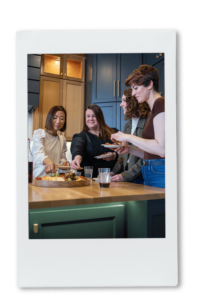 Girls sharing a charcuterie board