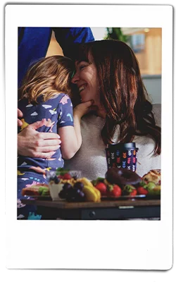 Instax picture of a mother hugging her daughter