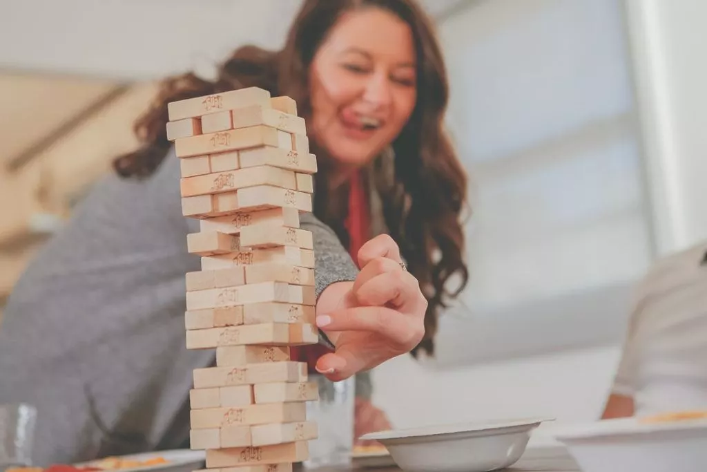 Woman playing Jenga