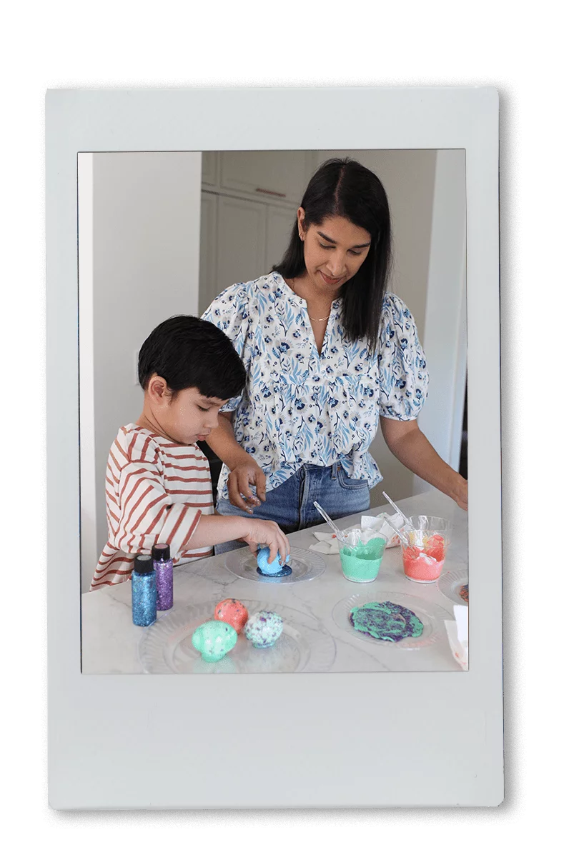 Instax of Mom & Son Dyeing Easter Eggs