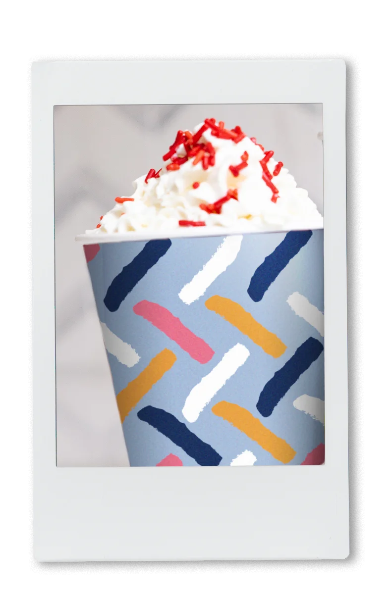 Instax of red velvet hot chocolate with whip cream in chinet comfort cup