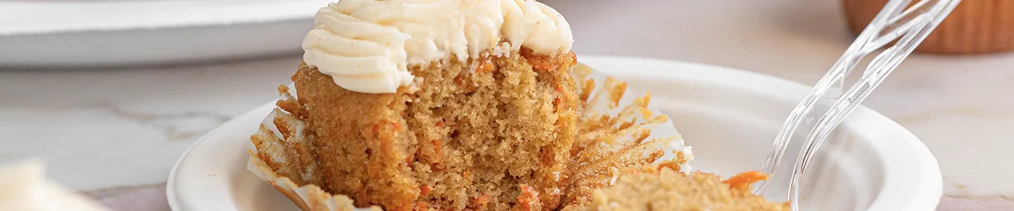 Carrot cake cupcake served on a Chinet Classic plate