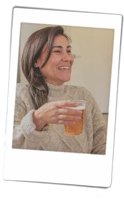 Instax picture of a woman drinking from a Chinet Crystal cup