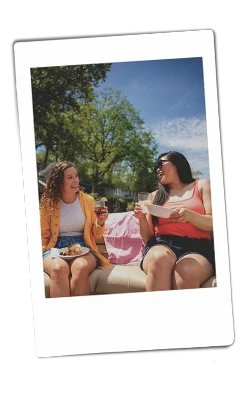 Instax picture of two women on a boat