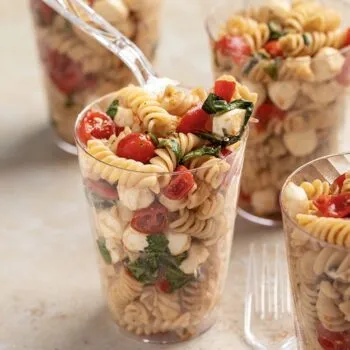 Caprese pasta salad served in Chinet Crystal cups