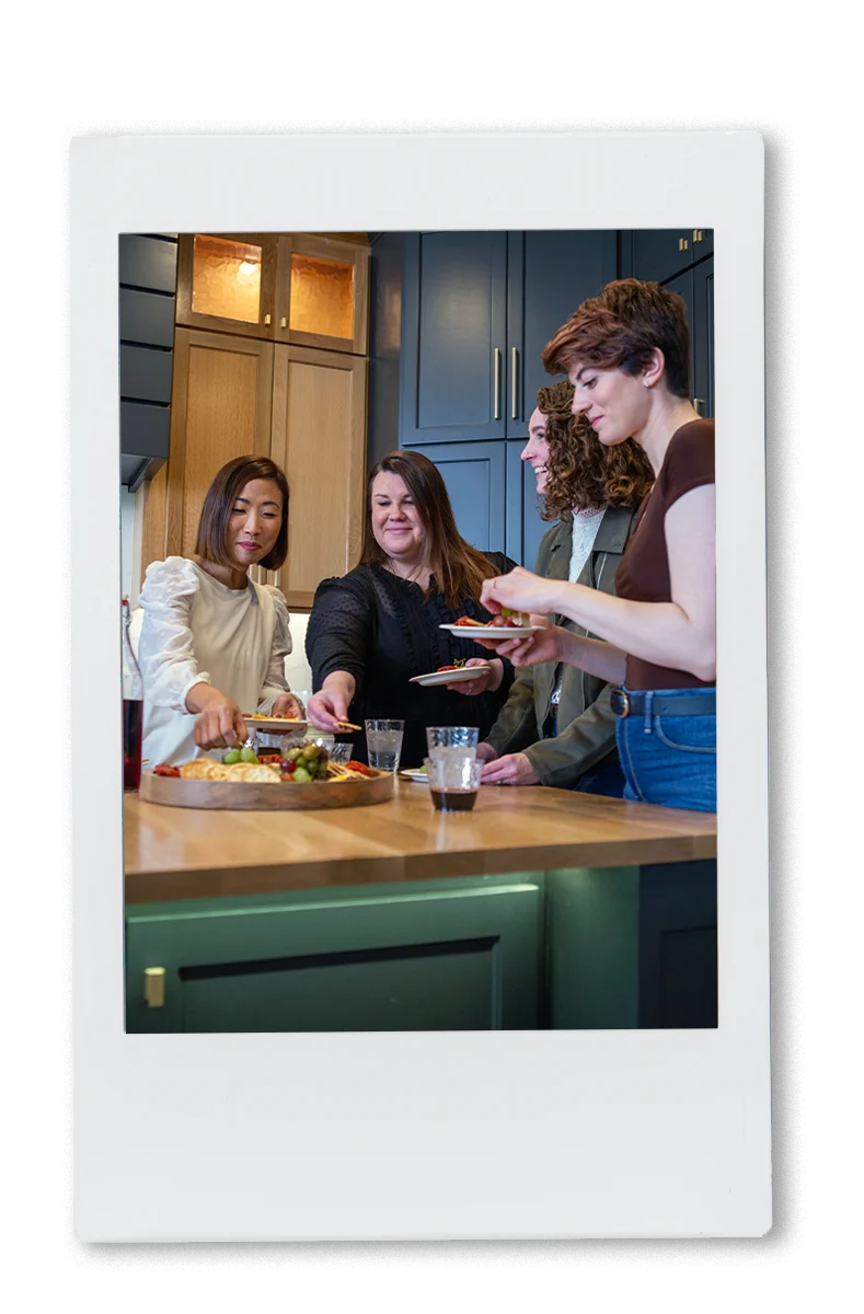 Girls sharing a charcuterie board